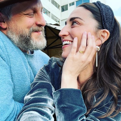 Sara Bareilles and Joe Tippett gazed into one another's eyes and showed her engagement ring.